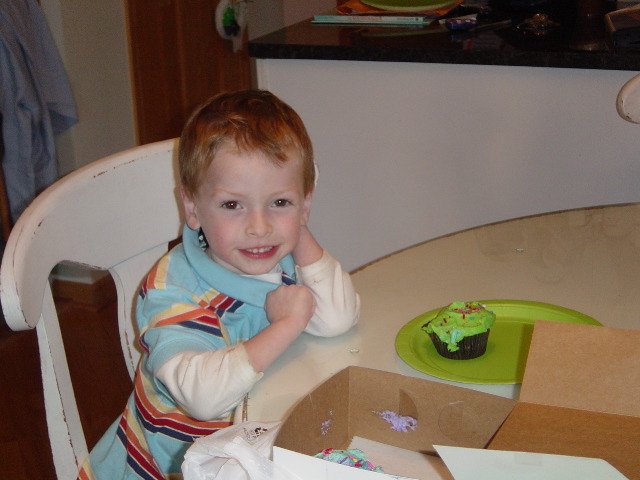 Zevan and his green cupcake