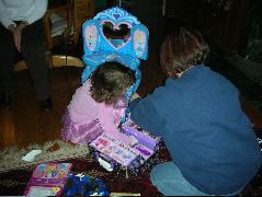 Opening Moppy's present.