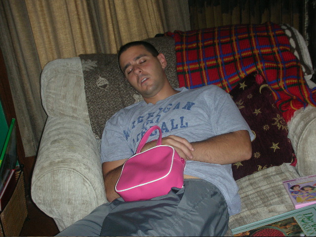 Uncle Dave fast asleep with his hot pink purse