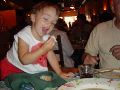 Dipping the bread in the mussel sauce