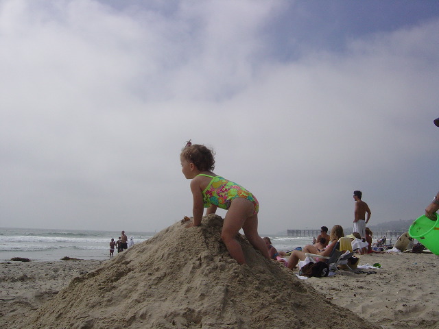 A favorite activity at the beach was building hills and then playing on them.