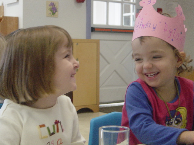 Smiling with her buddy Alexa