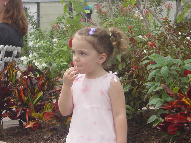 Mischievous kid playing with gum.