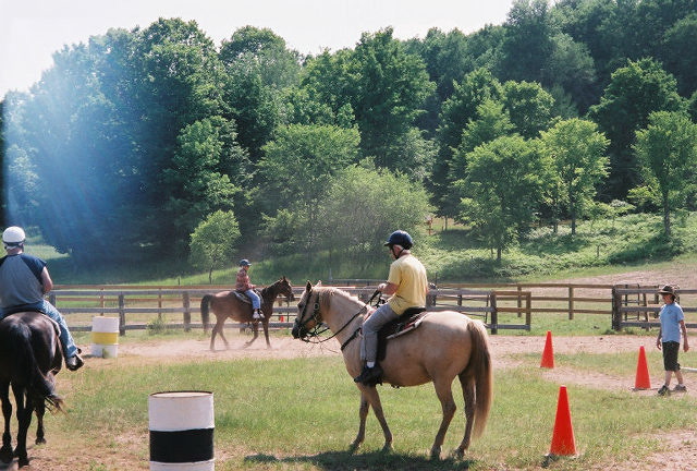 Daddy learning how to ride.