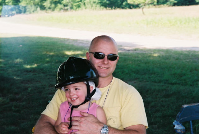 The two horseback riders.