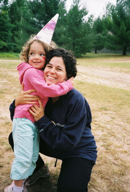 An excited Dylan hugs Mommy just before the Unicorn arrives.