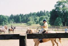 Daddy stopping his horse after a canter.