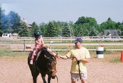 Having fun on the horse.