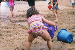 Making a lake in the sand.